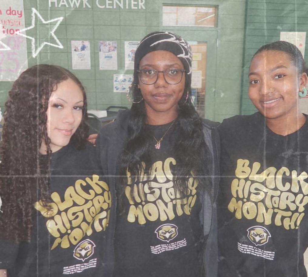 Members of the Black Student Union wearing the shirts